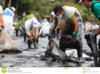 thailand-environment-oil-pollution-ko-samet-july-royal-thai-navy-personel-local-volunteers-clean.jpg
