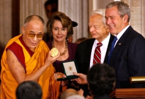 Dalai Lama shows off Congressional Medal